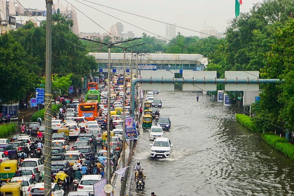 | Photo: PTI : Weather: Waterlogging after rains